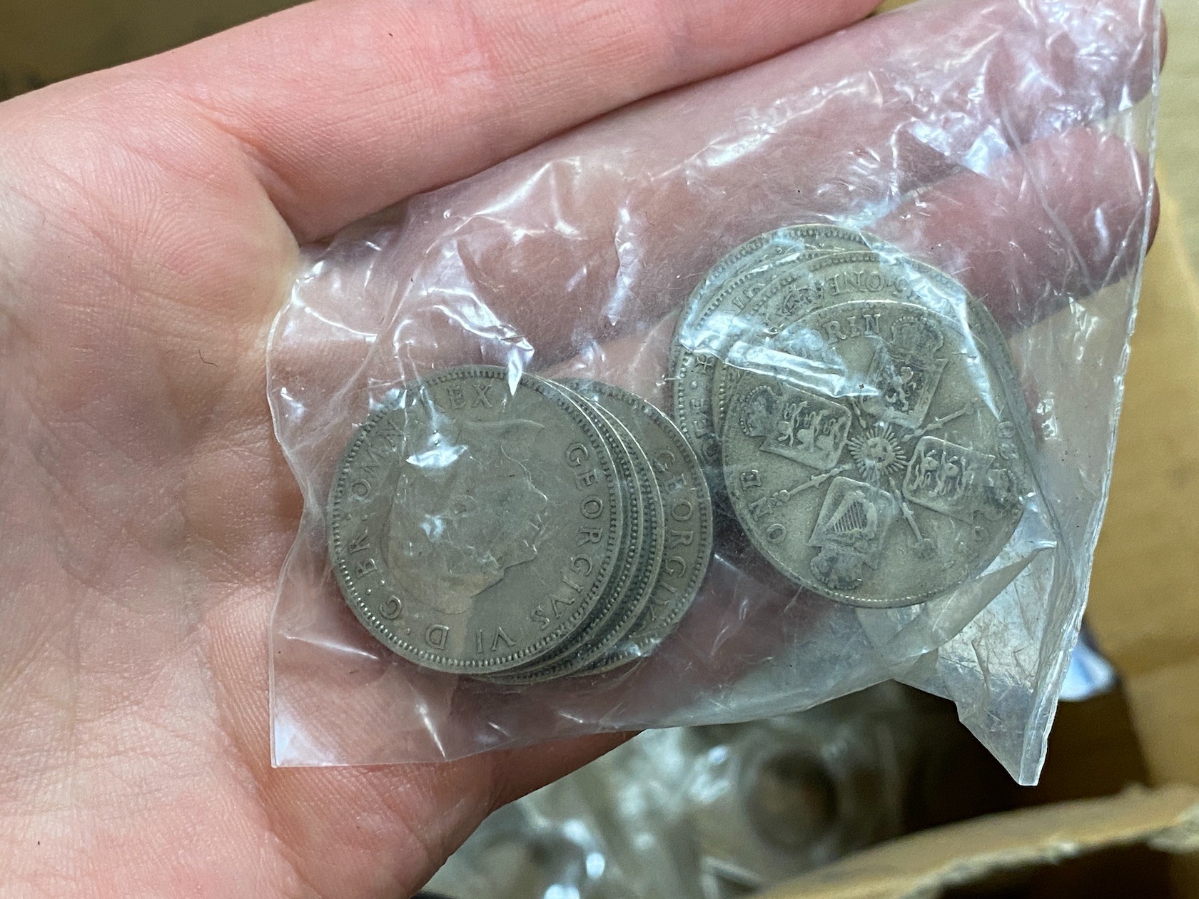 A box of assorted coins, mostly George V to QEII